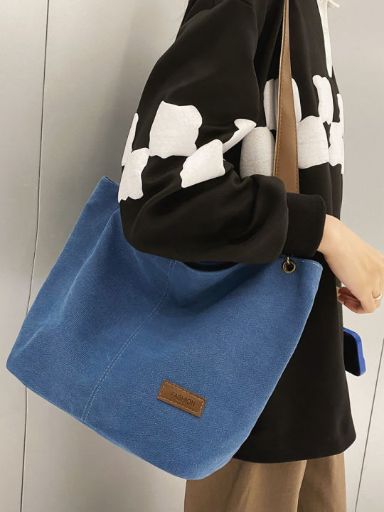 fashion-canvas-bag-womens-2023-autumn-and-winter-new-street-trendy-womens-bags-simple-commute-shoulder-tote-bag-2023