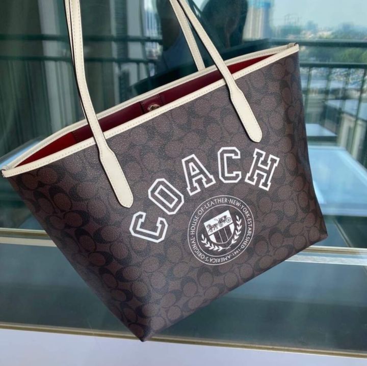 Coach City Tote In Signature Canvas With Varsity Motif