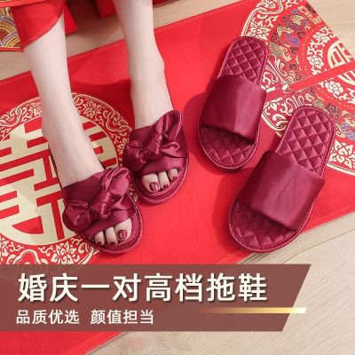 Married the new slippers festival couples are a pair of big red wedding bride and groom indoor