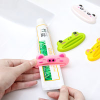 การ์ตูนรูปสัตว์พลาสติกเครื่องจ่ายยาสีฟันหลอด Squeezer Rolling Holder