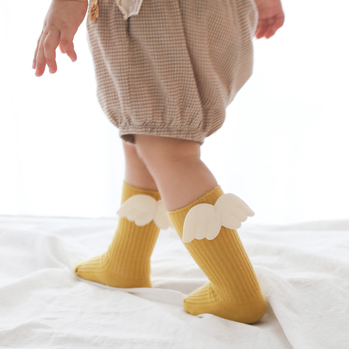 สาวเด็กถุงเท้าน่ารักแองเจิลวิงเด็กยาวเข่าเจ้าหญิงถุงน่องลูกอมสีสีขาวลื่นเด็กสำหรับ0-3y-เด็กวัยหัดเดินทารกแรกเกิด