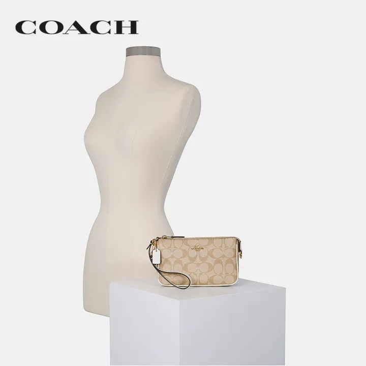 coach-กระเป๋าคล้องมือผู้หญิงรุ่น-nolita-19-in-signature-canvas-สีครีม-c3308-imdqc