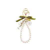 Ins green ribbon is lily phone hang usb key defense to throw the bell orchids key hang bag accessories female