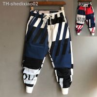 ℗✁ Calça de streetwear solta masculina elástico na cintura patchwork estampado laço fina bonito casual estilo jovem primavera verão