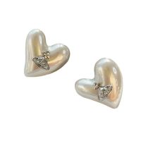 Westwood Vivian small trendy European and American temperament love pearl Saturn shape personality exaggerated exquisite earrings female fashion 2023 imported