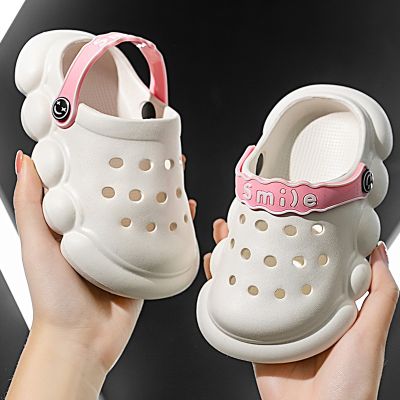 Children summer hole hole shoes female ins tide outside wear non-slip baotou pure color thick soft bottom bottom beach out cute sandals