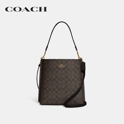 COACH กระเป๋าสะพายไหล่ผู้หญิงรุ่น Mollie Bucket Bag In Signature Canvas สีน้ำตาล CA561 IMAA8