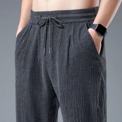คลังสินค้าพร้อมกางเกงขายาวทรงหลวมแนวเกาหลีสำหรับผู้ชายกางเกงลำลองสำหรับกางเกงผ้าไหมระบายอากาศได้ดี