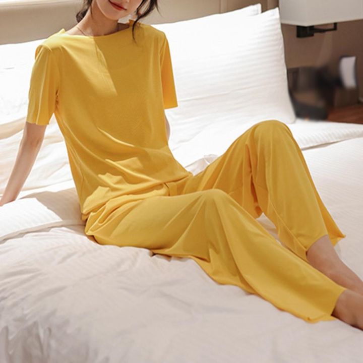 ชุดนอนหลวมชุดนอนลำลองสำหรับผู้หญิงสีล้วนระบายอากาศชุดนอนคอยืดหยุ่นรอบชุดนอน