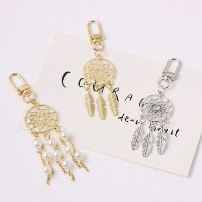 🔥🔥🔥[Fast delivery] Ethnic retro palace woven dream catcher feather leaf door buckle airpods pendant car key chain