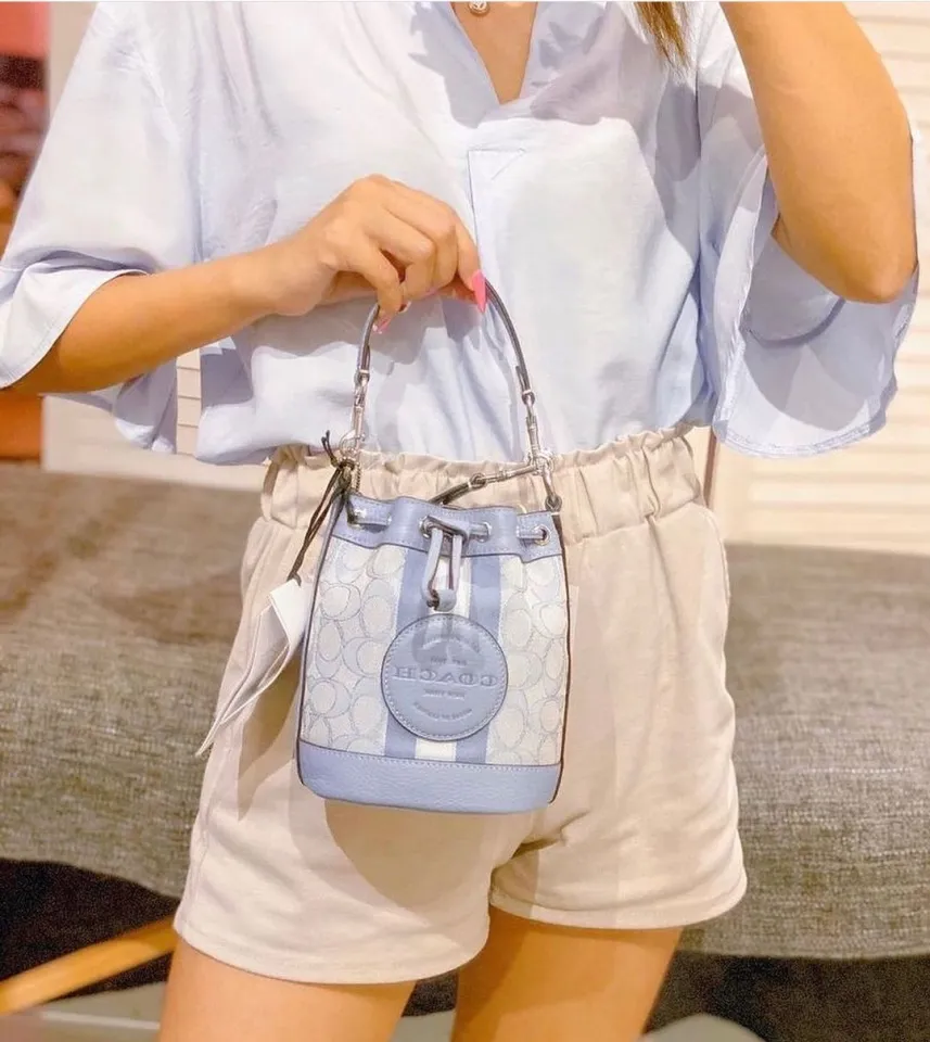 COACH Dempsey Drawstring Bucket Bag In Signature Denim in Blue