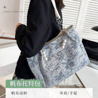 * 2022ใหม่เกลือทะเลสีฟ้า Jacquard ผ้าใบกระเป๋าโท้ทความจุขนาดใหญ่สไตล์ตะวันตกกระเป๋าสะพายไหล่แบบถือเฉพาะสำหรับนักศึกษา