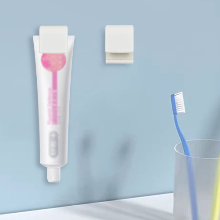 พร้อมส่ง-ที่คีบยาสีฟันชั้นวางแบบแขวนติดผนังแบบไม่เจาะรูครีมล้างหน้าตัวเก็บยาสีฟันติดผนังในห้องน้ำ
