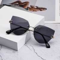 1pc New Rimless Cat Eye Sunglasses Sexy Luxury Design Women Metal Sunglasses Fashion Shades UV400 Protection Eyewear