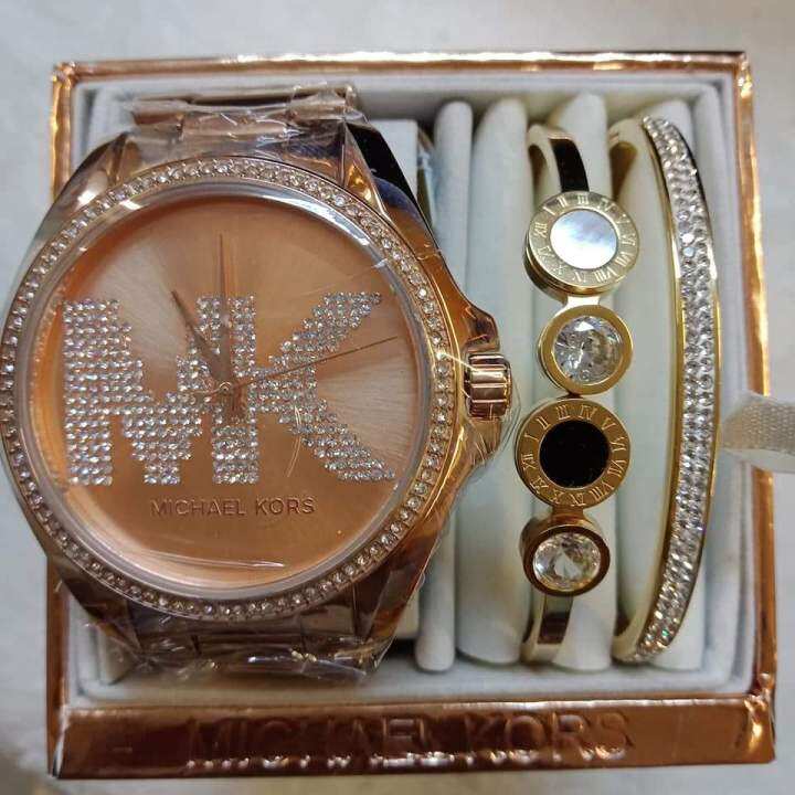 Michael kors watch with mk logo on on sale face