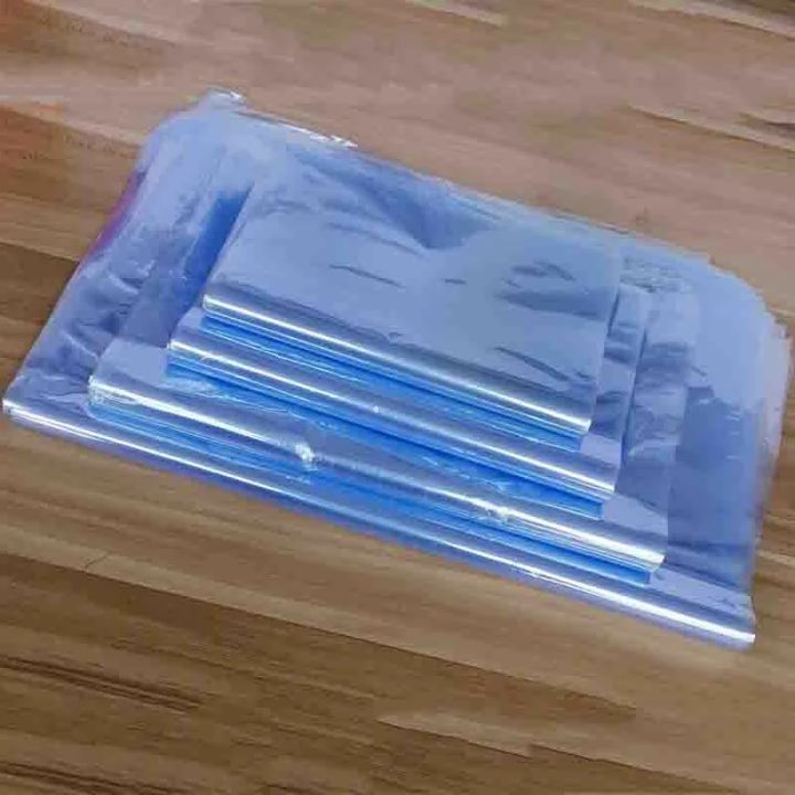 yurongfx-100ชิ้นกันน้ำพีวีซีความร้อนฟิล์มหดกระเป๋าเครื่องเป่าลมความร้อนหดห่อซีลปากแบน-diy-ถุงเก็บสีฟ้าถุงพลาสติกใส