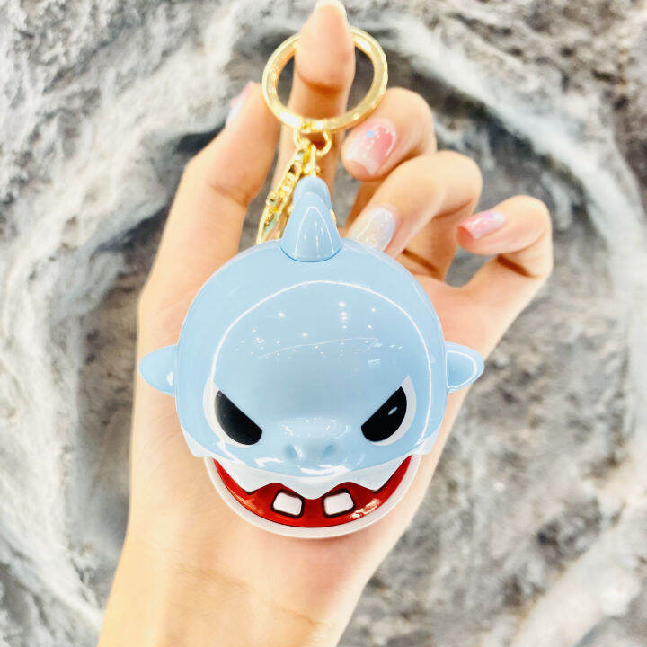 cartoon-shark-bell-keychain-shark-biting-hand-extracting-teeth-prank-backpack-pendant