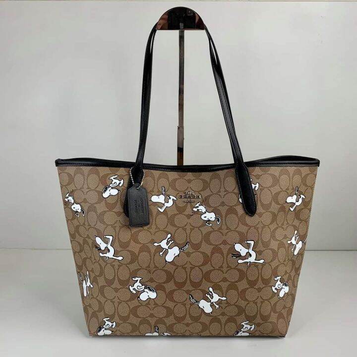 Coach X Peanuts City Women S Tote In Signature Canvas With Snoopy Print