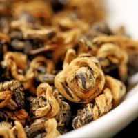 Yunnan black tea one bud one leaf red golden snail authentic Yunnan Fengqing Mingqian spring tea handmade black tea