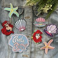 Ariel Little Mermaid เงือกน้อย เปลือกหอย ตัวรีดติดเสื้อ อาร์มรีด อาร์มปัก ตกแต่งเสื้อผ้า หมวก กระเป๋า แจ๊คเก็ตยีนส์ Movie Embroidered Iron on Patch