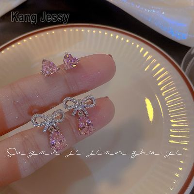 Kang Jessy ต่างหูโบว์เพทายสีชมพูหวานและเย็น ins การออกแบบที่เรียบง่ายซูเปอร์แฟลชหัวใจต่างหูกระดูกเล็บความรู้สึกสูงต่างหูผู้หญิง