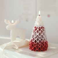 A large Christmas tree modelling scented candles no fire sitting room photograph place props scented candle