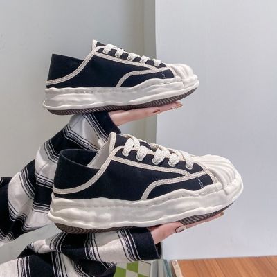 Dissolve two black shell head wear casual canvas shoes 2022 spring new ins tide take the hot style
