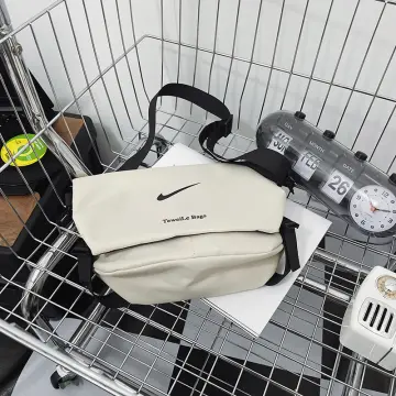 Nike pvc sling online bag