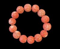 Coral craved bracelet for men.