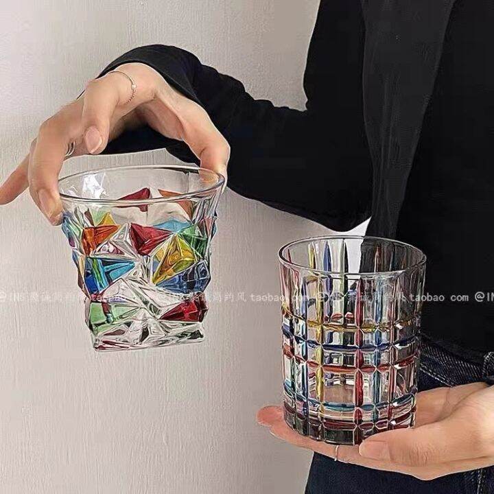 italian-designer-with-the-same-hand-painted-middle-aged-glass-whiskey-cup-reflect-rainbow-luster-painted-water