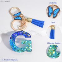 Blue Sequin Filled 26 Letters Keychain with Tassel Butterfly Pendant for Women Bag Ornament Car Key Holder Accessorie Party Gift