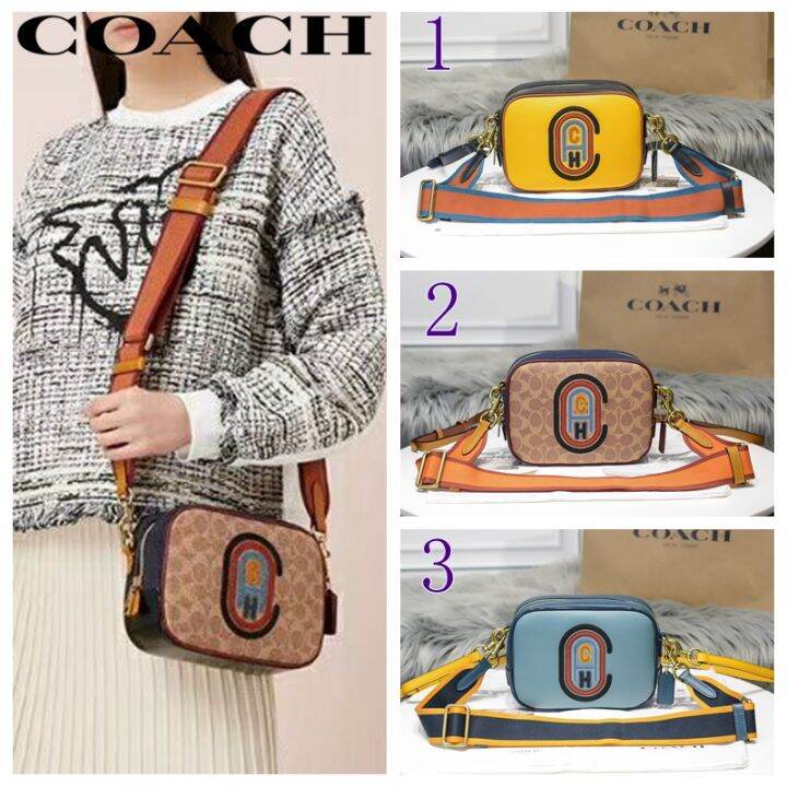 Coach camera bag discount with thick strap