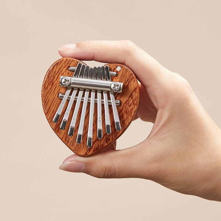 มินิแบบพกพา8คีย์แผ่นเปียโน-kalimba-thumb-นิ้วเครื่องมือฝึกเปียโนนิ้วมือสำหรับผู้เริ่มต้นของขวัญคริสต์มาส