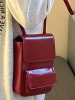 European and American fashion niche solid color portable single shoulder tassel casual messenger bag wine red mobile phone bag magnetic buckle camera bag 〖WYUE〗