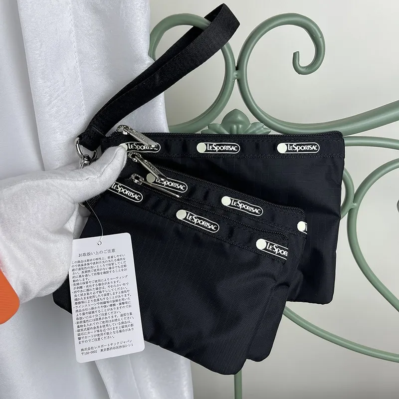 LeSportsac Co-branded casual wrist bag handbag makeup storage bag  three-piece set 3455 Lazada
