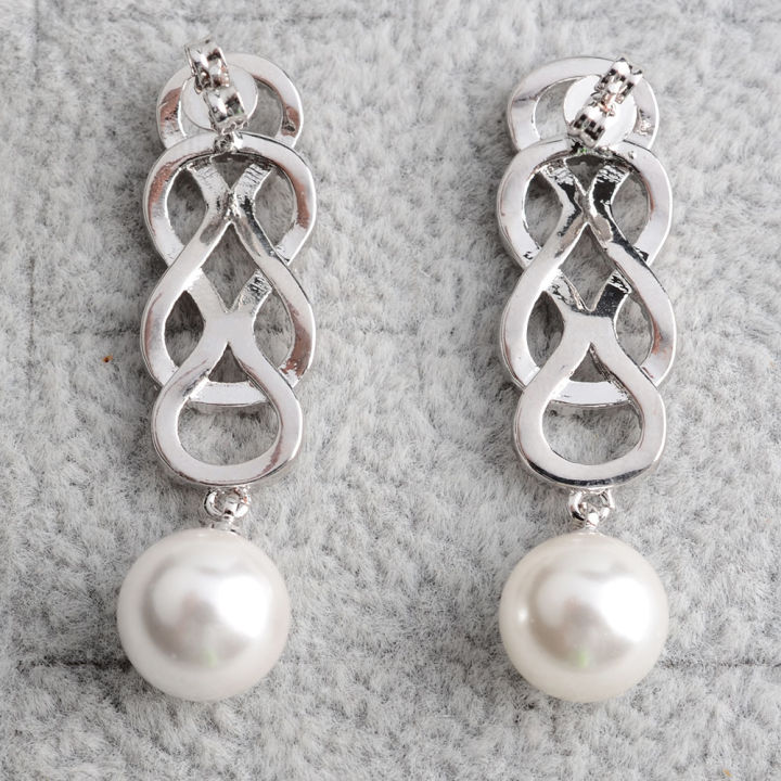 white-teardrop-sea-shell-pearl-white-golden-plated-cz-pave-earrings