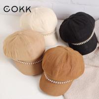 COKK Beret ผู้หญิงฤดูใบไม้ร่วงฤดูหนาวผ้าฝ้ายแปดเหลี่ยมหมวกผู้หญิงจิตรกรหมวกย้อนยุคลูกปัดโซ่แฟชั่นเกาหลีลำลองเด็กส่งหนังสือพิมพ์หมวกหญิง