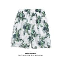 Real shot mens Korean version of the leaf print drawstring design loose straight Hawaiian style thin beach shorts.