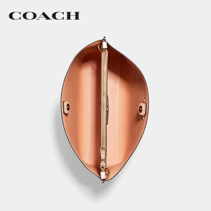 coach-กระเป๋าสะพายไหล่ผู้หญิงรุ่น-mollie-bucket-bag-in-signature-canvas-สีครีม-ca561-imdqc