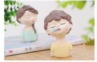 ตุ๊กตาเรซิ่นเด็กสีเหลือง ขนาดความสูง 10.5 เซนติเมตร