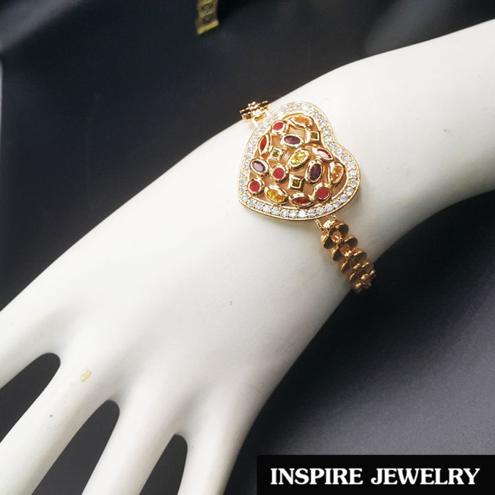 inspire-jewelry-สร้อยข้อมือกึ่งกำไล-ฝังพลอยนพเก้า-และล้อมด้วยฝังเพชรสวิส-สวยงามมาก-งานแฟชั่นชั้นนำ