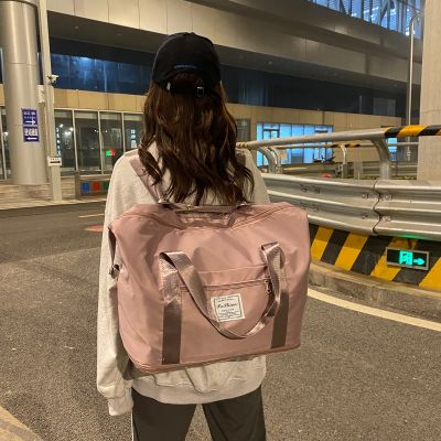 Oversized clothes hand luggage bag womens shoulders light large capacity short-distance travel storage bag can be set trolley case