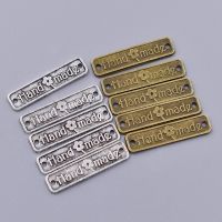 100Pcs/lot 2.50x0.60cm Metal Alloy Handmade Letter Printed Labels Double Hole Clothing Labels For Garment Diy Sewing Materials Stickers Labels