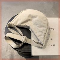 Uniqlo original dumpling bag female 2023 new one-shoulder canvas bag mobile phone bag all-match ins nylon cross-body small bag