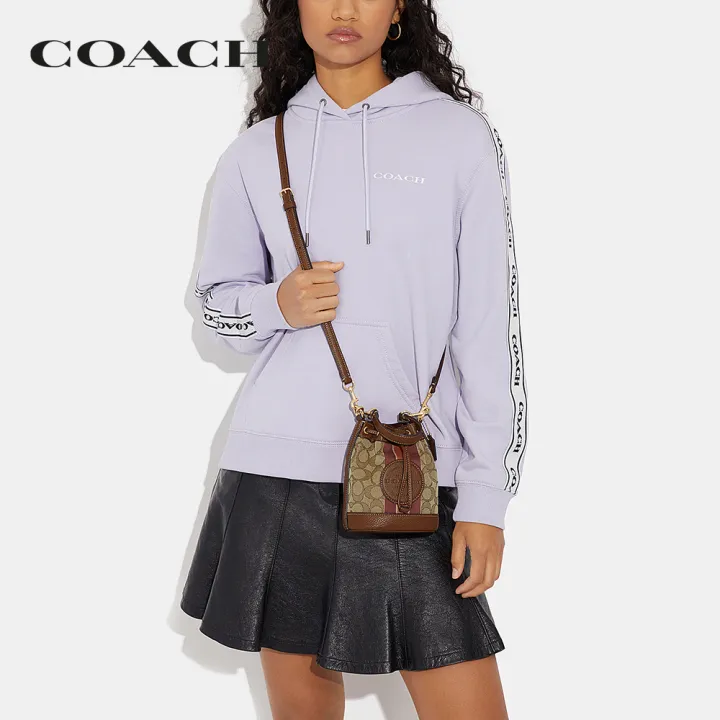 coach-กระเป๋าสะพายข้างผู้หญิงรุ่น-mini-dempsey-bucket-bag-in-signature-jacquard-with-stripe-and-coach-patch-สีน้ำตาล-c8322-imvgb