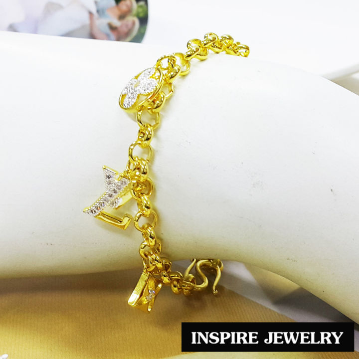 inspire-jewelry-สร้อยข้อมือกึ่งกำไล-ฝังพลอยนพเก้า-และล้อมด้วยฝังเพชรสวิส-สวยงามมาก-งานแฟชั่นชั้นนำ