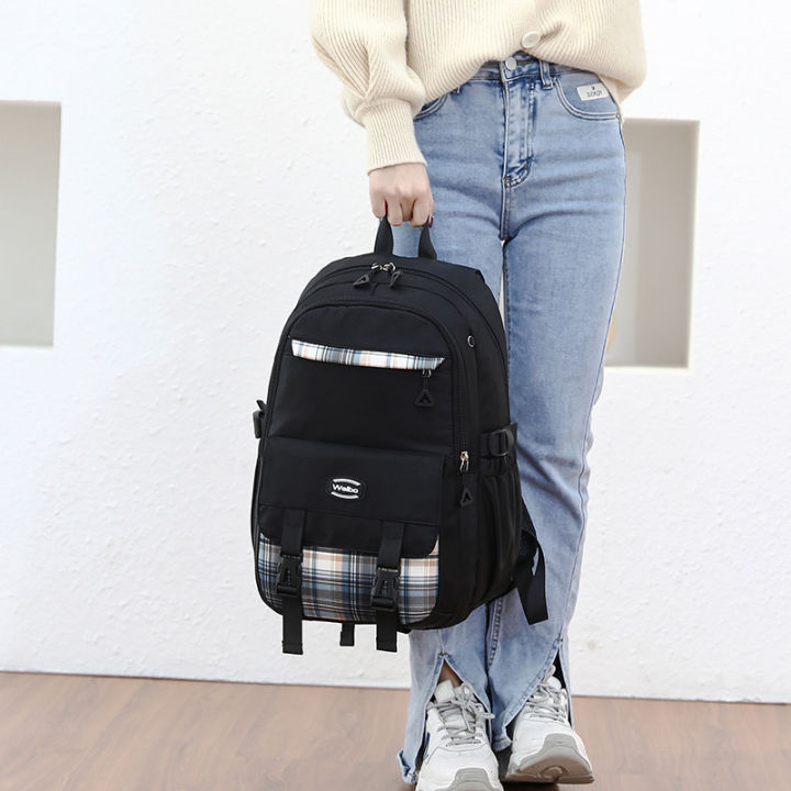 กระเป๋าเป้สะพายหลัง2023ใหม่สไตล์เกาหลี-กระเป๋าลำลองขนาดใหญ่ใส่ของได้ทั้งกระเป๋าเป้ประถมและมัธยมนักเรียนสีตัดกันกระเป๋านักเรียนไนลอนขายส่ง