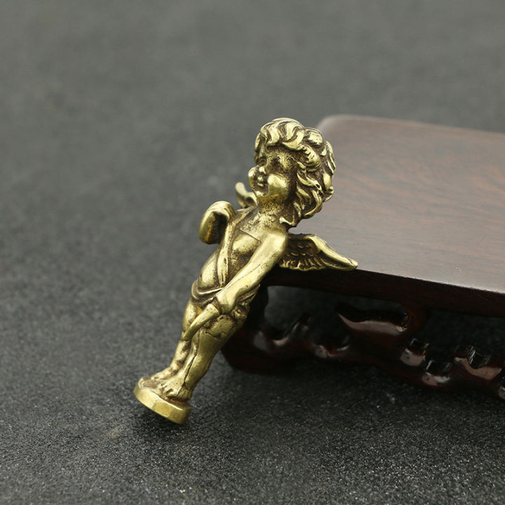 รูปปั้นกามเทพทองเหลืองทึบโบราณรูปปั้นเทพเจ้าแห่งความรักตกแต่งโต๊ะสำนักงานบ้านขนาดเล็ก