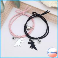 X-STARRY 2 Pair น่าสนใจร่วมกัน กำไลข้อมือคู่ อีลาสติก ปรับได้ปรับได้ สร้อยข้อมือจี้ไดโนเสาร์ แฟชั่นสำหรับผู้หญิง แม่เหล็กแบบแม่เหล็ก กำไลเชือกมิตรภาพ คู่คู่กัน