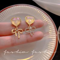 [COD] love pearl earrings female niche high-end fashion temperament asymmetrical bow